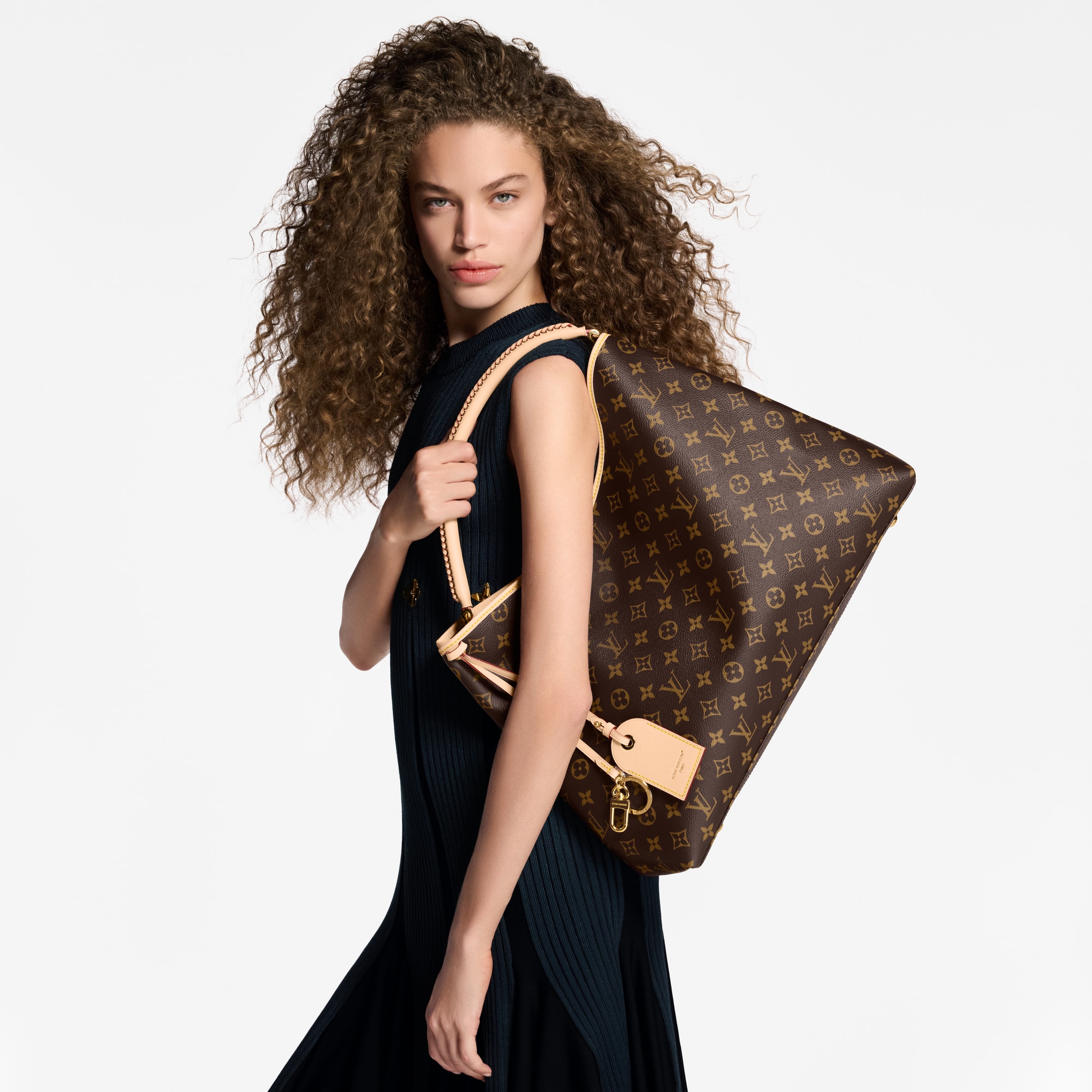 Again Monogram Canvas in Women