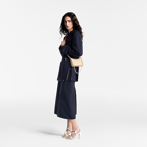 Easy Pouch On Strap Monogram Empreinte Leather in Women's Wallets and Small Leather Goods All Wallets and Small Leather Goods collections by Louis Vuitton (Product zoom)