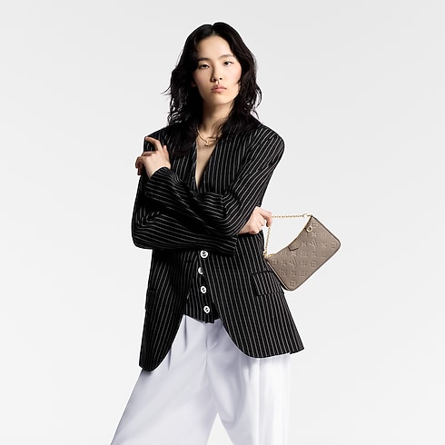 Easy Pouch On Strap Monogram Empreinte Leather in Women's Wallets and Small Leather Goods All Wallets and Small Leather Goods collections by Louis Vuitton (Product zoom)