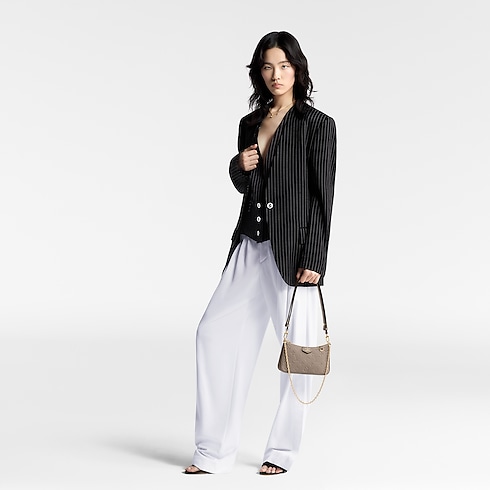 Easy Pouch On Strap Monogram Empreinte Leather in Women's Wallets and Small Leather Goods All Wallets and Small Leather Goods collections by Louis Vuitton (Product zoom)