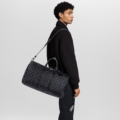 Keepall Bandoulière 45 Monogram Eclipse in Men's Travel Softsided Luggage and Duffle Bags collections by Louis Vuitton (Product zoom)
