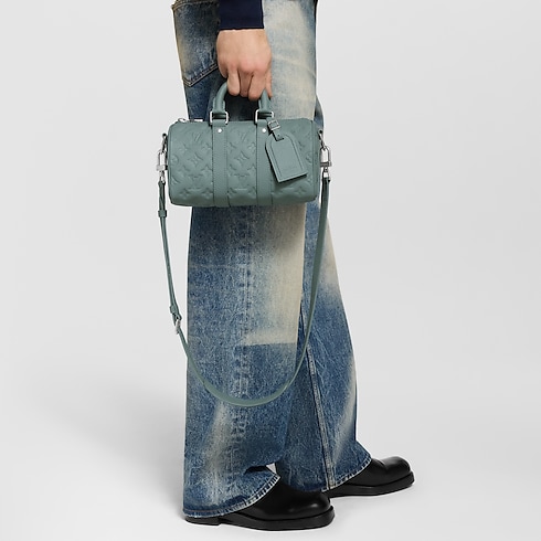 Keepall Bandoulière 25 Monogram Taurillon Leather in Bags and Small Leather Goods's Men Bags LV Icons collections by Louis Vuitton (Product zoom)