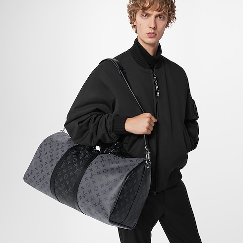 Keepall Bandoulière 50 Monogram Eclipse Canvas in Men's Travel Softsided Luggage and Duffle Bags collections by Louis Vuitton (Product zoom)