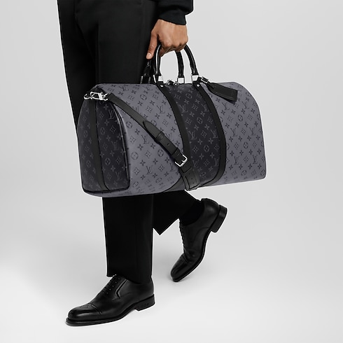 Keepall Bandoulière 50 Monogram Eclipse Canvas in Men's Travel Softsided Luggage and Duffle Bags collections by Louis Vuitton (Product zoom)