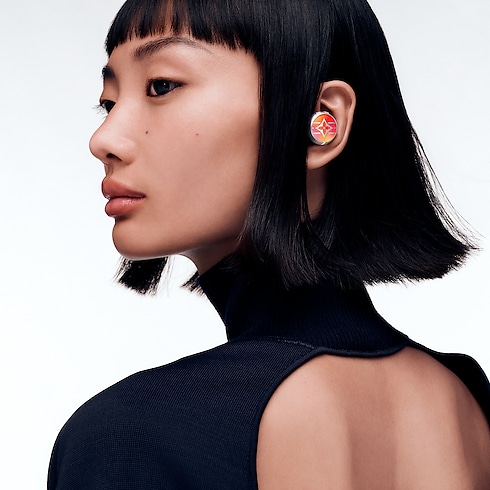 Louis Vuitton Horizon Light Up Earphones - Red-to-Orange Gradient in Trunks, Travel and Home's High-Tech Objects and Accessories Audio, Connected Watches and Accessories collections by Louis Vuitton (Product zoom)