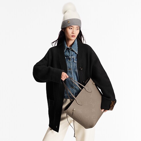 Neverfull MM Tote Bag Monogram Empreinte Leather in Women's Handbags Handbags collections by Louis Vuitton (Product zoom)