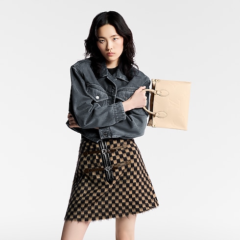 OnTheGo PM Monogram Empreinte Leather in Women's Handbags Handbags collections by Louis Vuitton (Product zoom)