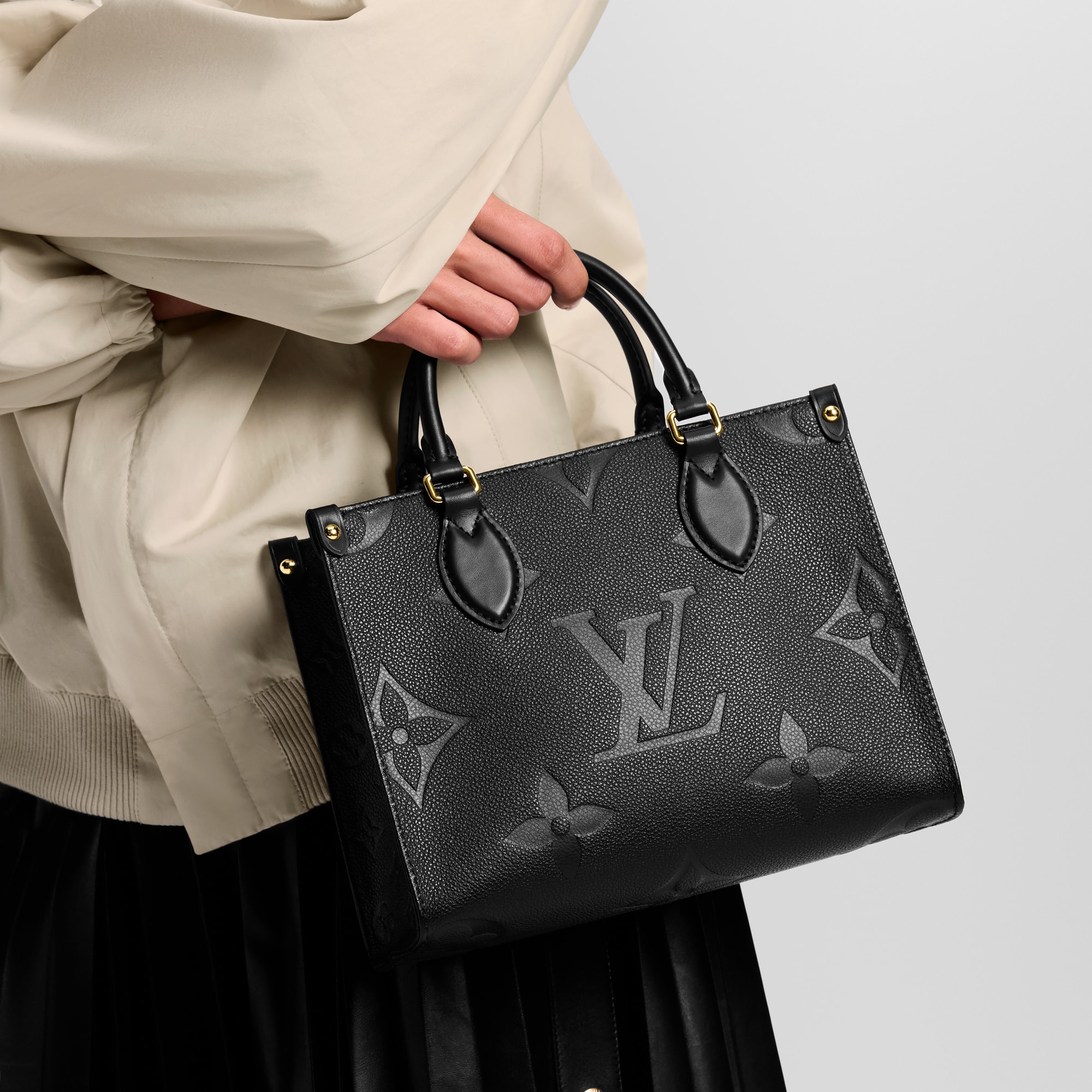 Onthego PM Tote Bag Monogram Empreinte Leather in Women