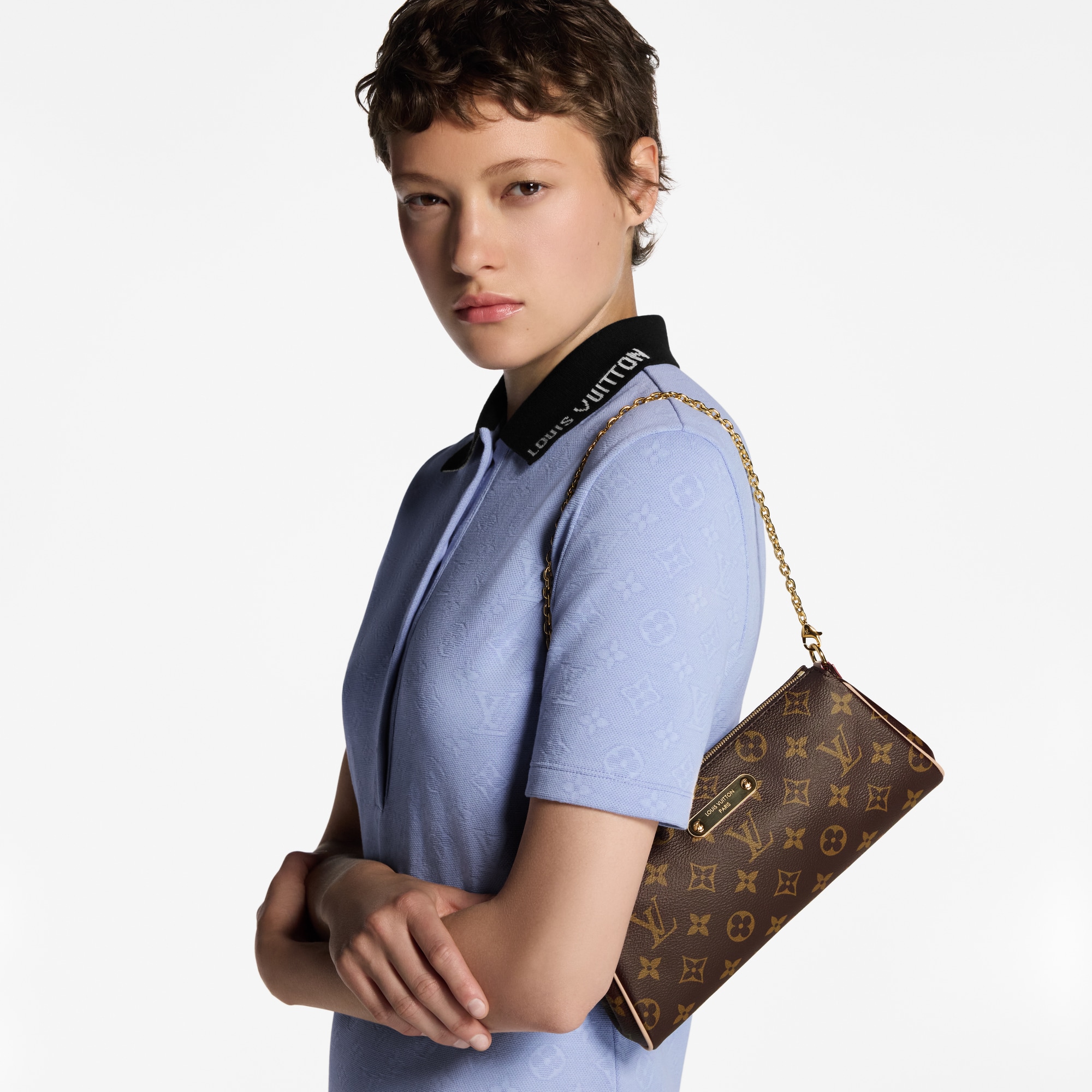 Pochette Eva Monogram Canvas in Women