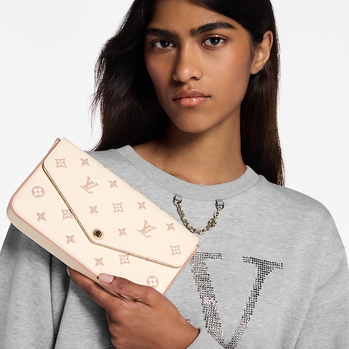 Pochette Félicie Monogram Empreinte Leather in Women's Wallets and Small Leather Goods Wallets on Chain and Micro Bags collections by Louis Vuitton (Product zoom)