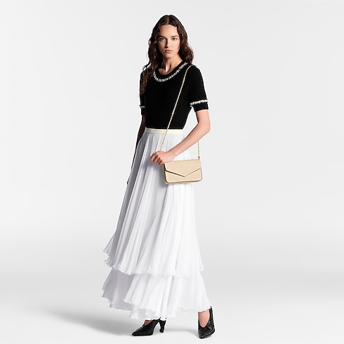 Pochette Félicie Monogram Empreinte Leather in Women's Wallets and Small Leather Goods Wallets on Chain and Micro Bags collections by Louis Vuitton (Product zoom)