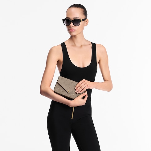 Pochette Félicie Monogram Empreinte Leather in Women's Wallets and Small Leather Goods Wallets on Chain and Micro Bags collections by Louis Vuitton (Product zoom)