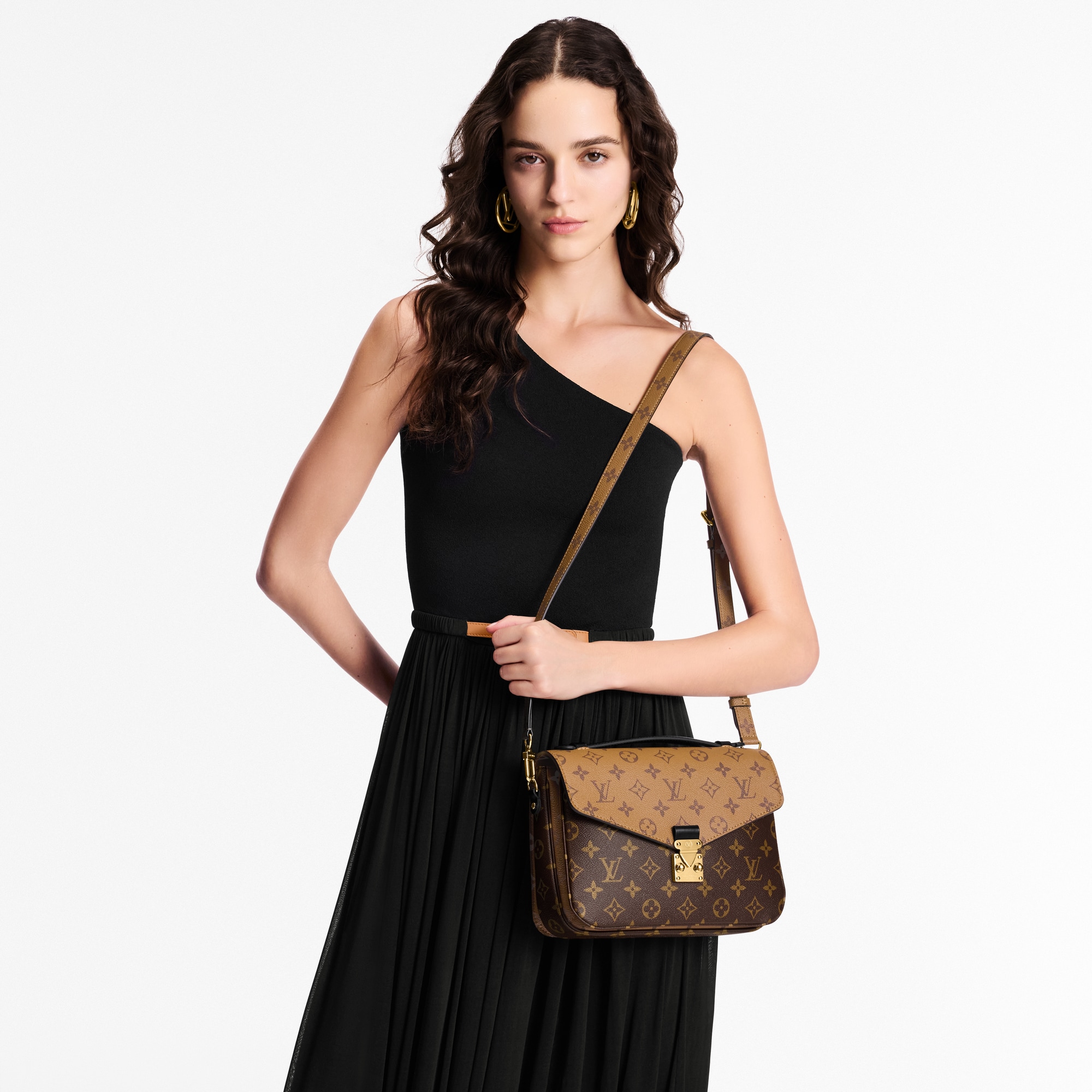 Pochette Métis Monogram Reverse Canvas in Women