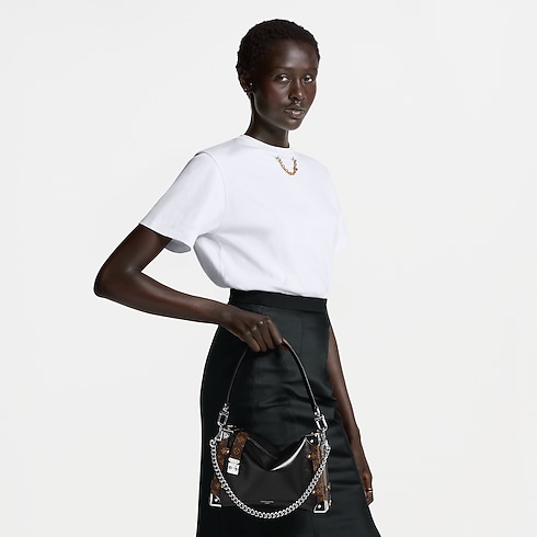 Side Trunk Vibe MM H34 in Bags and Small Leather Goods's Women Bags LV Icons collections by Louis Vuitton (Product zoom)