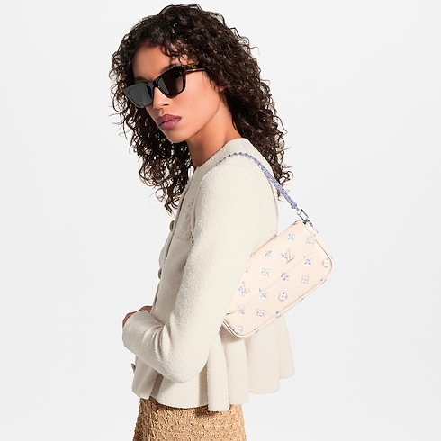 Wallet On Chain Ivy Monogram Empreinte Leather in Women's Wallets and Small Leather Goods Nano Bags and Chain Wallets collections by Louis Vuitton (Product zoom)